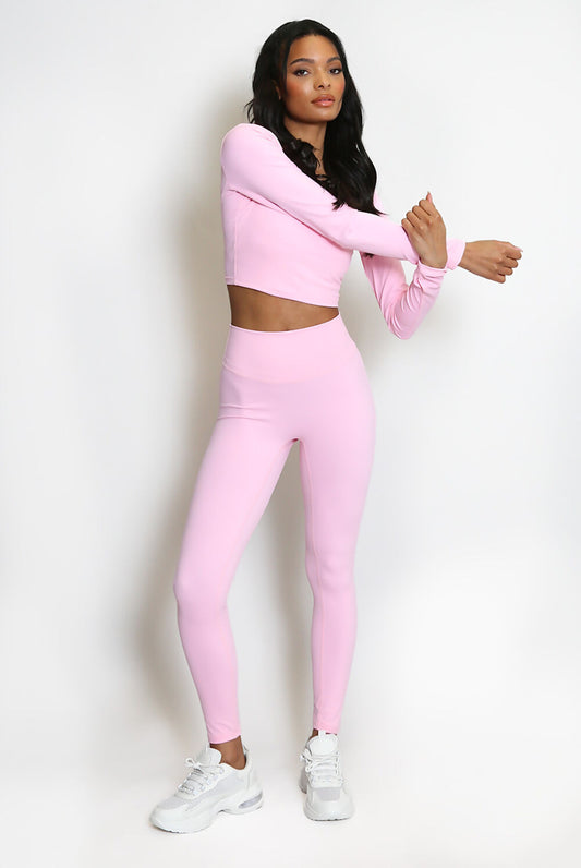 Pink Long-Sleeve Crop Top and High-Waisted Leggings